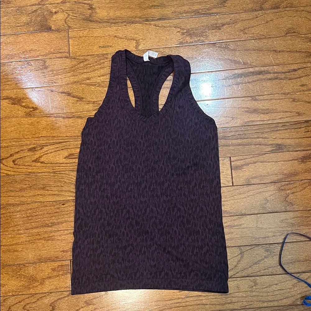 215. Athleta XS purple and black tank top size